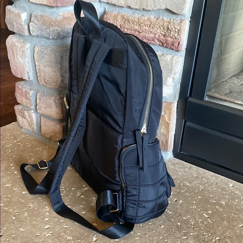 Adrienne Vittadini Black and Gold Backpack with Quilted Design Excellent cond.
